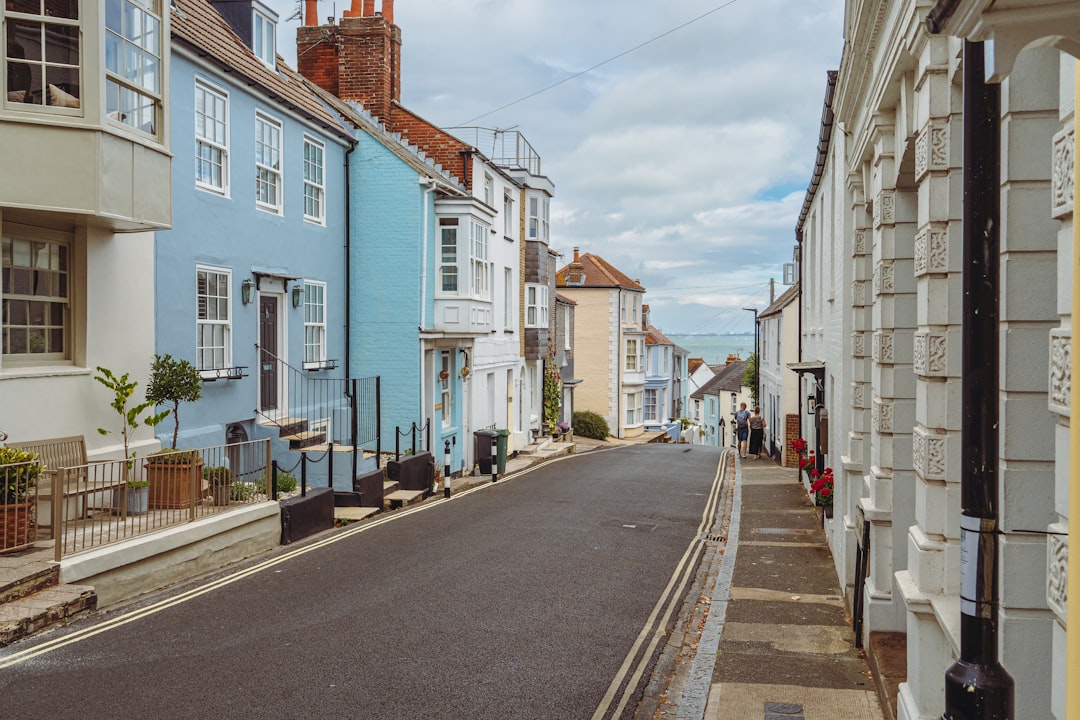 A sunny street of period houses on the south coast